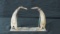 CARVED BONE OR HORN PENQUINS W/METAL BASE