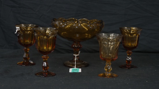 IMPERIAL AMBER COLORED GLASS BOWL AND FOUR GLASSES