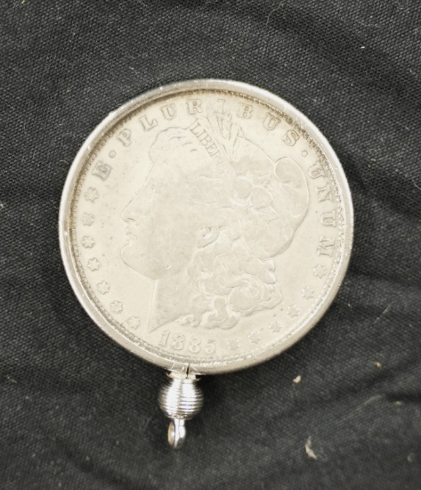 1885 MORGAN SILVER DOLLAR WITH BEZEL