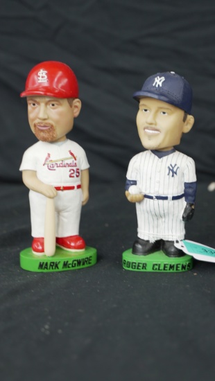 TWO MLB BOBBLE HEADS MARK MCGWIRE & ROGER CLEMENS MARK MCGWIRE  ARIZONA CARDINALS & ROGER CLEMENS .