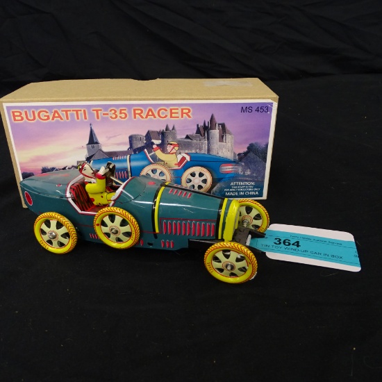 TIN TOY WIND-UP CAR IN BOX