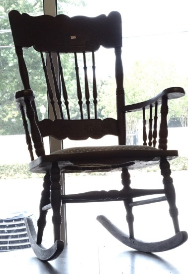 ORNATE WOOD ROCKER WITH UPHOLSTERED SEAT