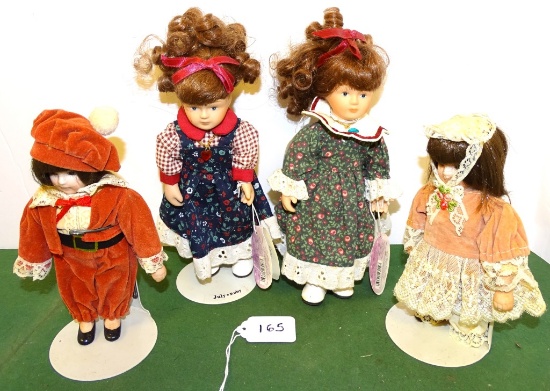 GROUP OF 4 PORCELAIN DOLLS 6"-8" TALL W/BASKET