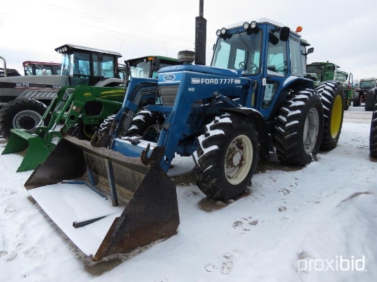 93107- FORD 7710 TRACTOR W/FORD 777F LOADER, MFWD, CAB AIR/HEAT, 18.4-34 TIRES, 3PT., PTO, 4