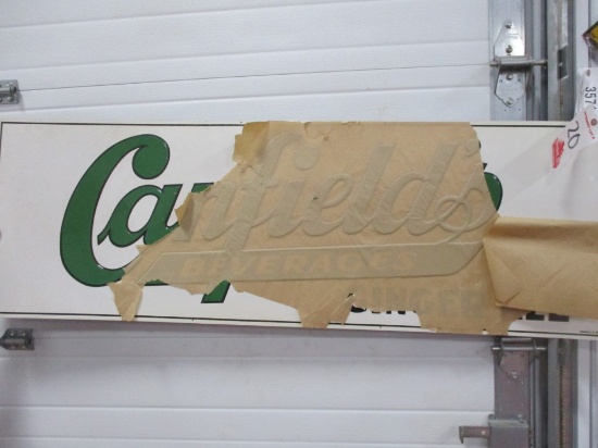 3563- 54" X  18" NOS SINGLE SIDED TIN CANFIELD'S BEVERAGE SIGN, DATED 1957