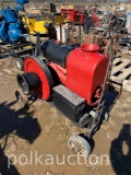 RED FAIRMONT ENGINE ON TRUCKS
