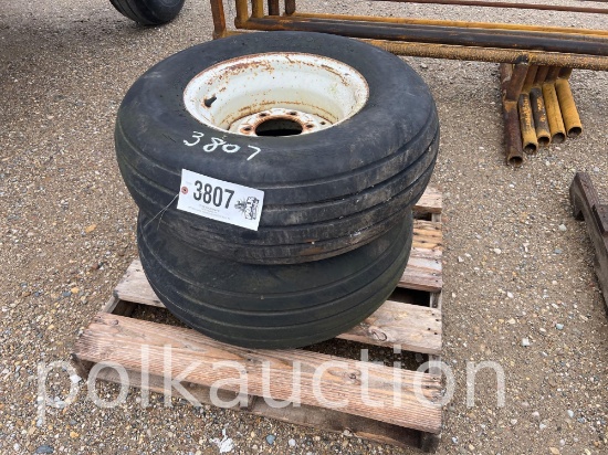 3807-PAIR OF 11 L 15 6HOLE IMPLEMENT WHEELS