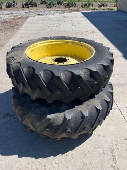 2152-(2) B.F. GOODRICH 16.9-38 TIRES ON 9-BOLT JD RIMS-CUT FOR PULLING