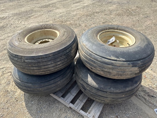 5879-(4) 14L-16.1SL TIRES/RIMS