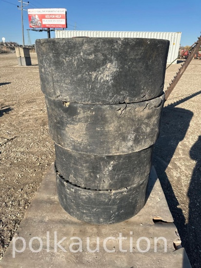 8730 - (4) SOLID CUSHION SKIDSTEER TIRES - 8-LUG