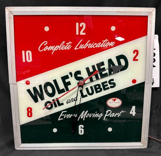 WOLF'S HEAD OIL & LUBES LIGHTED CLOCK - 16.5" x 16.5"