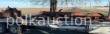CONTENTS ON TOP OF TRAILER (PLOW & TRACTOR PARTS) (CF)