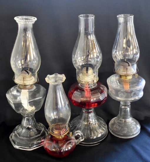 FOUR KEROSENE OIL LAMPS