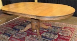 ROUND OAK CLAW FOOT DINING TABLE