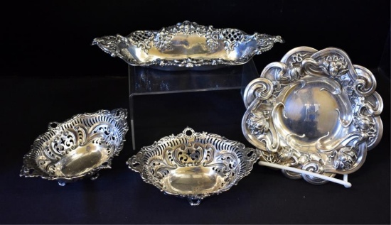 FOUR SMALL STERLING SILVER DISHES