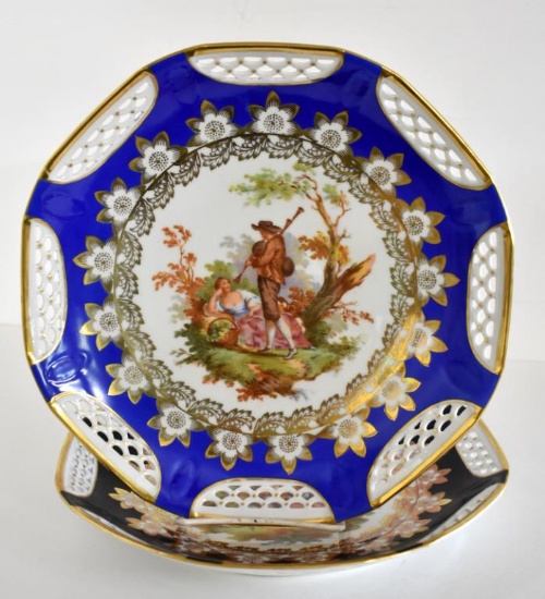 TWO GERMAN DECORATIVE WALL PLATES WITH PIERCED RIM