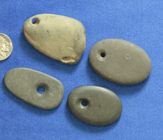 Four Pebble Pendants.