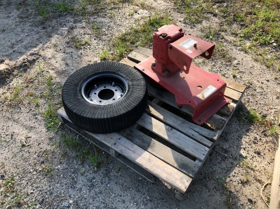 PALLET OF (1) BUSH HOG BRUSH CUTTER GEAR BOX, (1) SOLID TIRE AND RIM