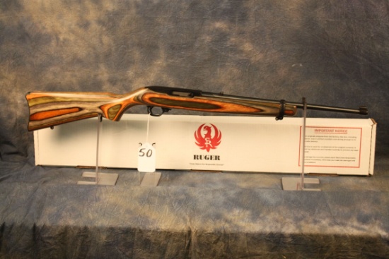 50. Ruger 10/22 Green Lam. Stock SN:258-26614