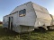 246. Nomad by Skyline 30’ Fifth Wheel Travel Trailer 13’ Main Area Slide Convertible Dinette & Sofa