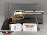 87. Ruger New Vaquero .45 Colt, NIB, Polished Stainless, Black Grips SN:512-44906