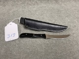 313. Buck Knife Model 107, Black leather scabbard, Excellent Condition