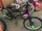Black and Green Avigo Brand Youth Bike with Front and Rear Pegs