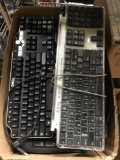 Box of wireless and wired keyboards