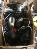 Box of assorted wired and wireless computer mice and accessories