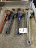 Assorted large pipe wrenches