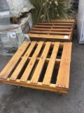 2 Stained Pallet Carts on Metal Castors