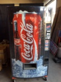 Coca Cola canned vending machine
