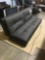 Relax-a-Lounger Merrilyn Euro Lounger Convertible Sofa in Black leather