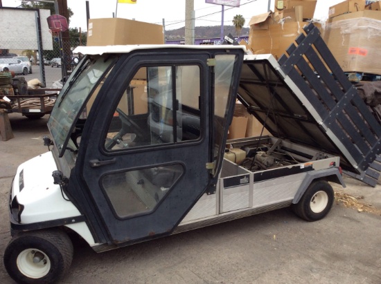 2004 Gas powered CLUB CAR w/ tilting access bed