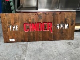 “The Cinder Room” sign