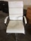 White and Silver High Back rolling chair