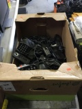 Box of assorted cordless home phones