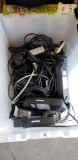 Bin of assorted power supplies and cables