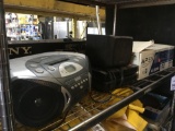 Shelf Lot of Assorted Electronics, RCA Boombox, Apex DVD Player, SDTV Tuners Etc.