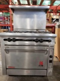 (1) Wolf. Range/Oven. Gas 115V. 4 burners. On wheels.