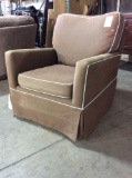 Brown Swiveling Rocking Chair