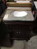 Granite Top Vanity With Porcelain Sink And Backsplash