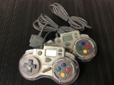 Lot of (2) Super Nintendo SN Programpad Controllers