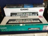 Lot of (2) Casio Keyboards and (1) Keyboard Stand