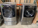 LG Large Washer and Dryer Pair With Pedestals in Graphite Steel