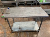 Work Table 24in x 48in Stainless Steel top with an Edlund can opener attached