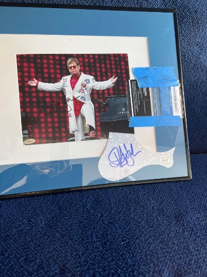 Elton John Autographed Photo and Guitar Pick Guard *WITH C. O. A*