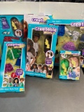 (5) Cases Assorted Creatable World Dolls and Clothes