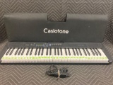 Casiotone 61-Key Portable Keyboard*TURNS ON*