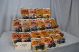 Flat of 19 - 1/64th scale tractors